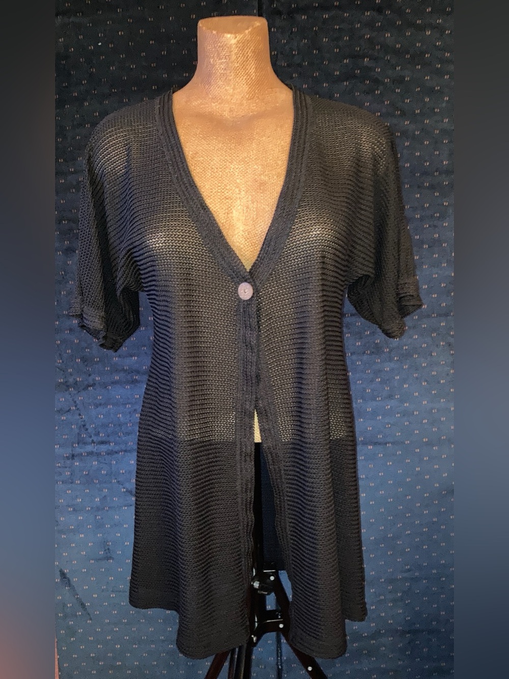 Dream Beach Black open-knit short-sleeve cardigan. Single button closure.